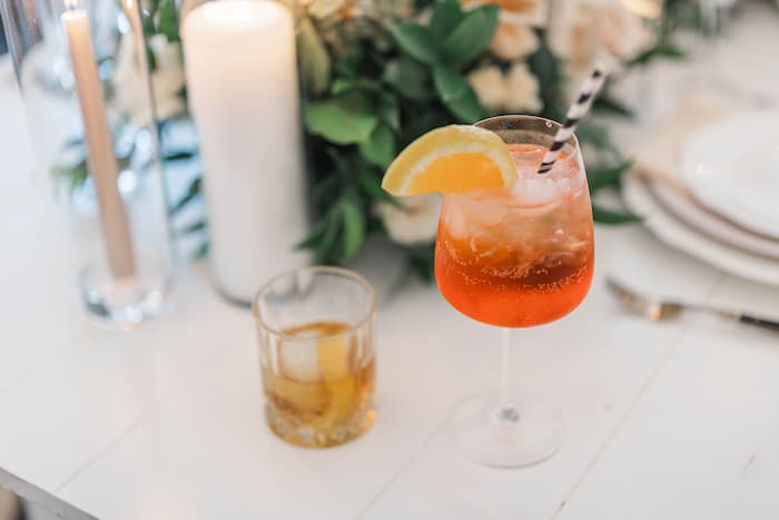 Beautiful Aperol spritz signature cocktail at a wedding reception