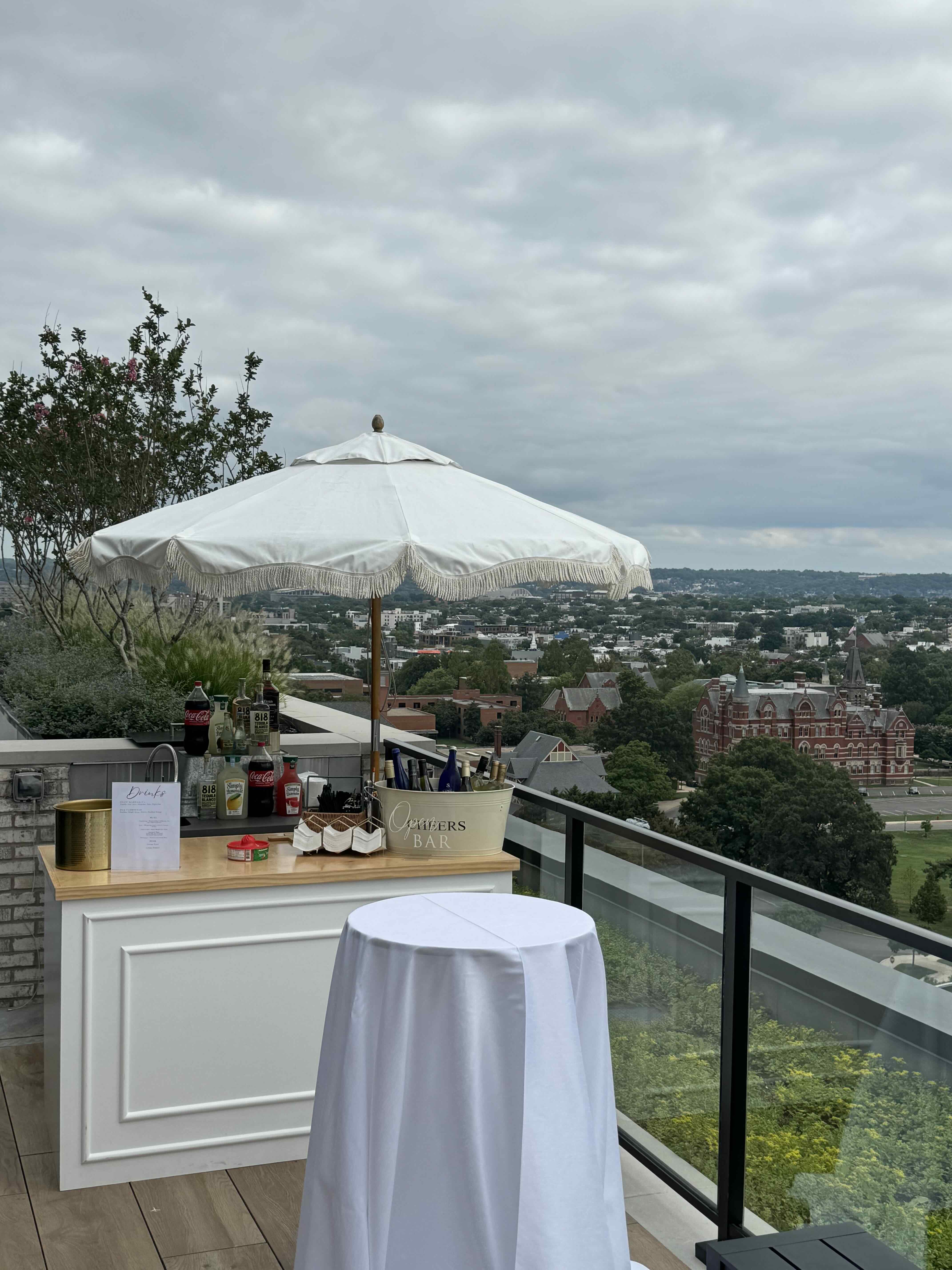 Rooftop bar service for corporate happy hour overlooking Washington DC skyline