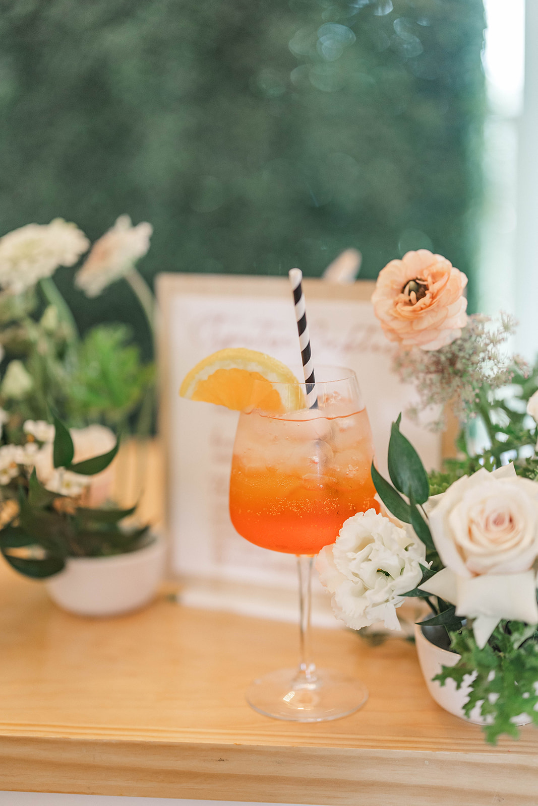His and Her wedding signature cocktails at a styled shoot at 1631 Event Venue Maryland showing an Aperol spritz and a whiskey drink