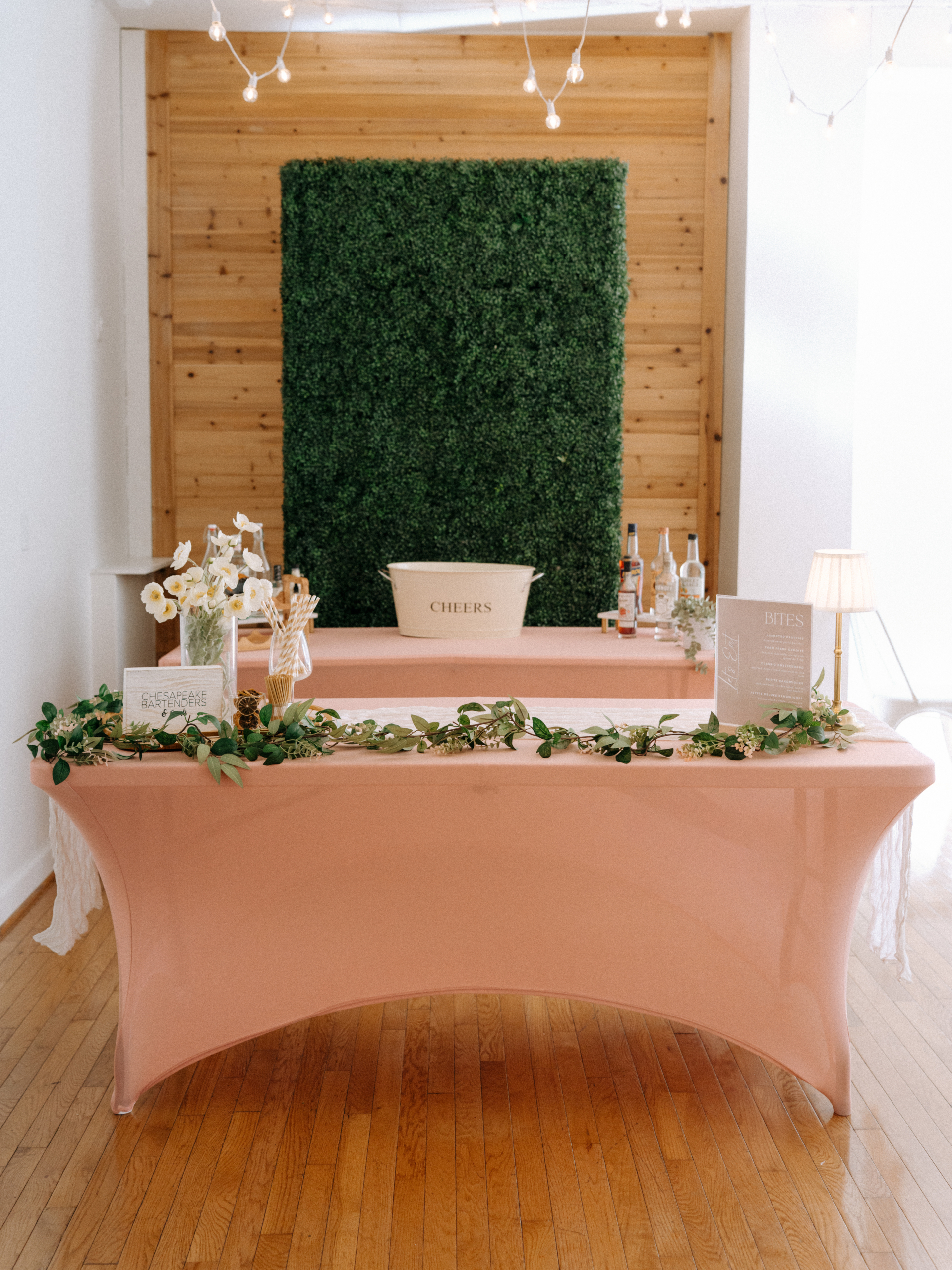 Dusty rose wedding bar with soft romantic florals and gold accents