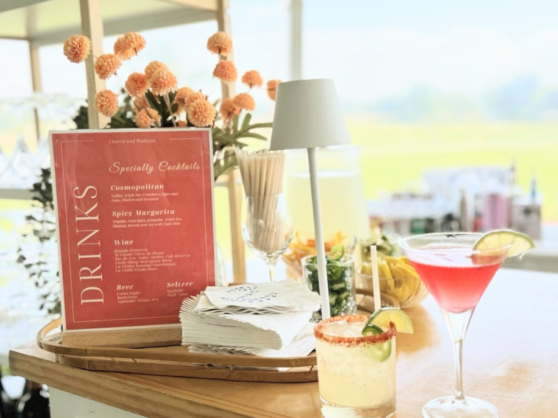 Signature drink menu displaying Classic Cosmopolitan and Spicy Margarita at Stepne Manor wedding bar