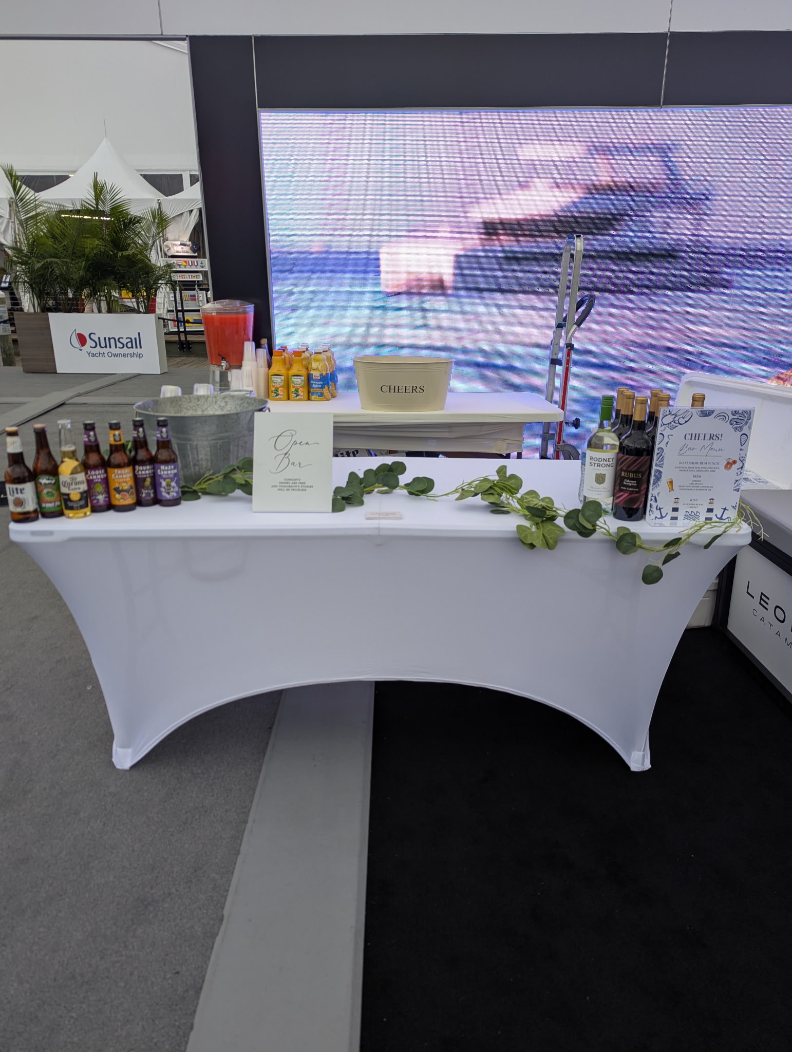 White classic bar set up with beer, wine, and pre-batched cocktail dispenser